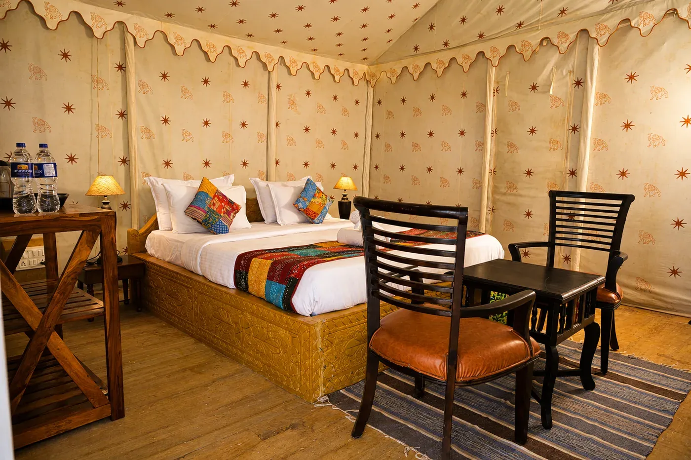 Royal king bed with handcrafted Rajasthani embroidery and heritage cushions